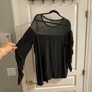 Gorgeous long sleeve semi sheer black top. Only worn twice.